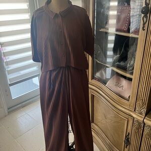 Lightly used , leisure day/ night 2 piece for travel outfit.